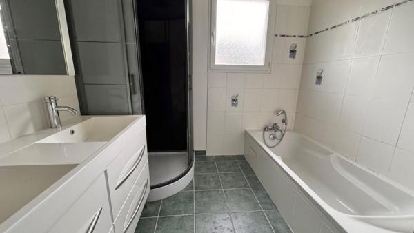 Ensemble immobilier composé de 2 maisons mitoyennes