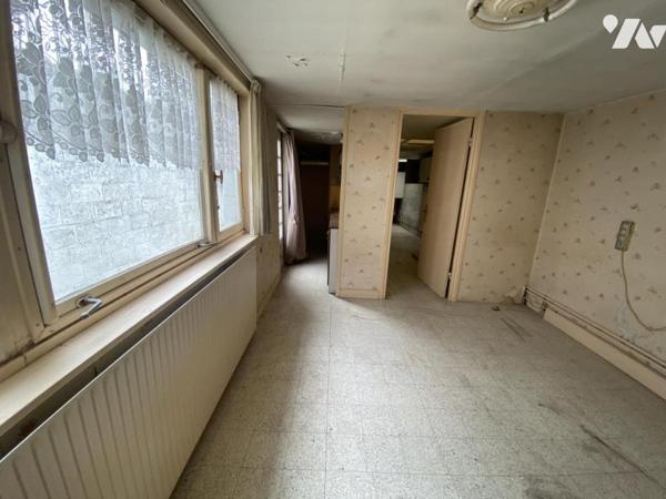 A VENDRE A SIN LE NOBLE : MAISON DE VILLE A RENOVER 2CH GARAGE COUR BATIE SUR 125M²