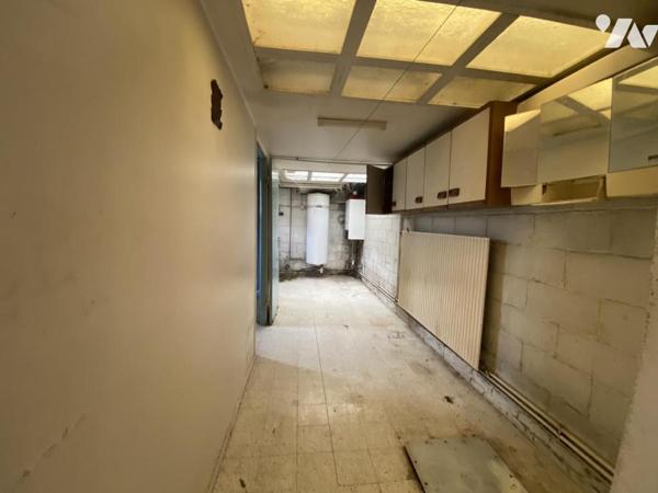 A VENDRE A SIN LE NOBLE : MAISON DE VILLE A RENOVER 2CH GARAGE COUR BATIE SUR 125M²