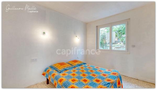 Villa de plain-pied 4 pièces sur grand terrain constructible proche de Roujan (34)