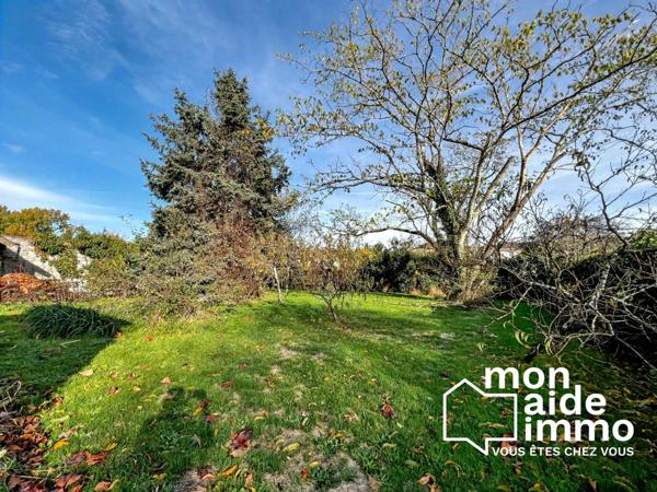 Plain-pied 3 chambres garage jardin