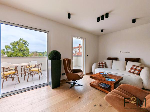 T3 MEUBLE AVEC BALCON, ROOFTOP PRIVATIF ET GARAGE A LOUER A CALUIRE