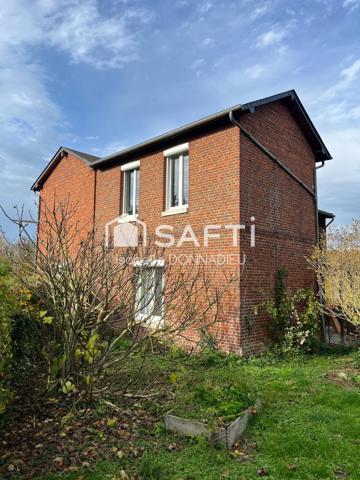 ENSEMBLE IMMOBILIER COMPORTANT 2 MAISONS