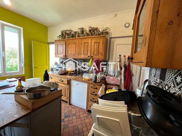 ENSEMBLE IMMOBILIER COMPORTANT 2 MAISONS