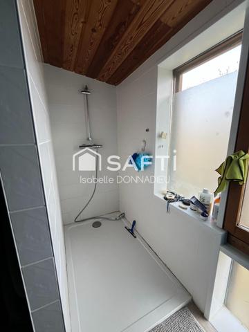 ENSEMBLE IMMOBILIER COMPORTANT 2 MAISONS