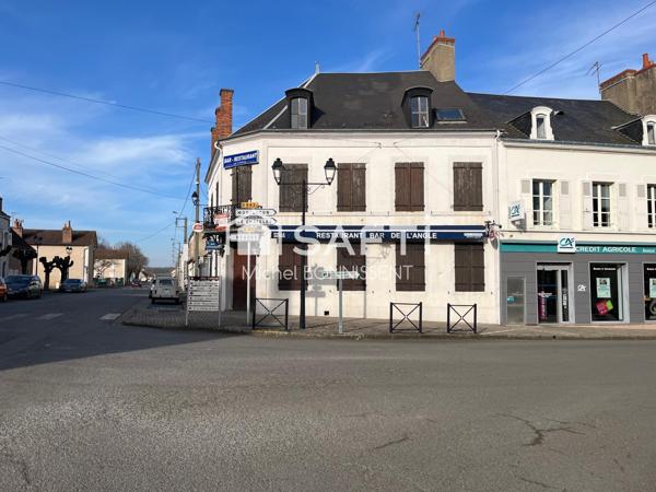 Immeuble commerce et appartement en centre ville