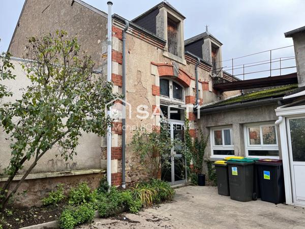 Immeuble commerce et appartement en centre ville