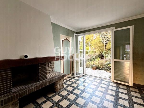 Maison mitoyenne - sous-sol et jardin