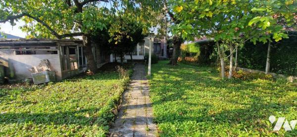 MAISON DE VILLE AVEC JARDIN ET GARAGE SITUEE SUR WAVRIN 