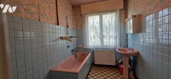 MAISON DE VILLE AVEC JARDIN ET GARAGE SITUEE SUR WAVRIN 