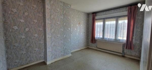 MAISON DE VILLE AVEC JARDIN ET GARAGE SITUEE SUR WAVRIN 