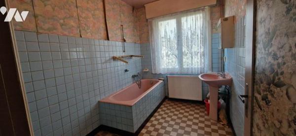 MAISON DE VILLE AVEC JARDIN ET GARAGE SITUEE SUR WAVRIN 