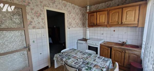 MAISON DE VILLE AVEC JARDIN ET GARAGE SITUEE SUR WAVRIN 