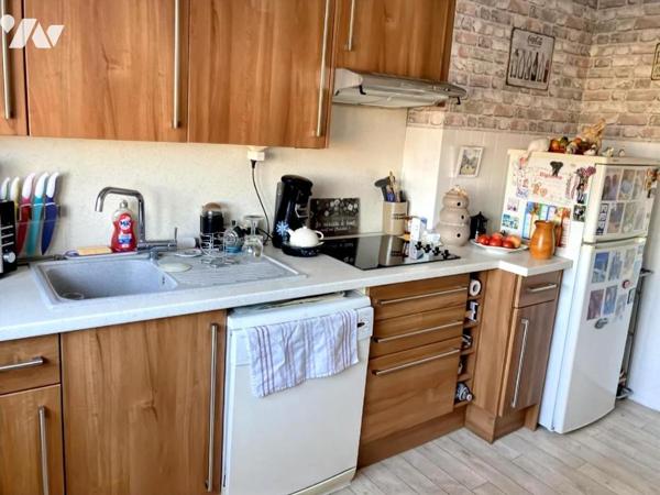 SAINTE CATHERINE - APPARTEMENT TYPE 3 de 86m² avec balcon et garage.