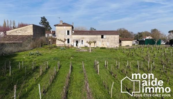 Belle maison en pierre de 200m² + grenier et garages sur 7000m² de terrain