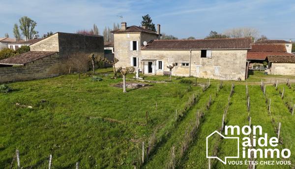 Belle maison en pierre de 200m² + grenier et garages sur 7000m² de terrain