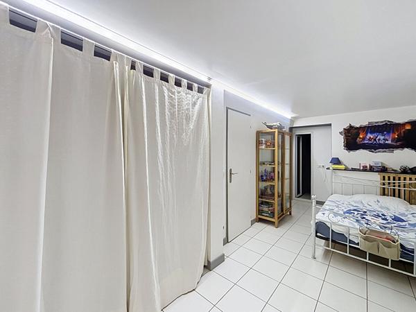 Appartement 3 pièces 98 m²  Charme troglodyte en hyper centre d'Aix-les-Bains