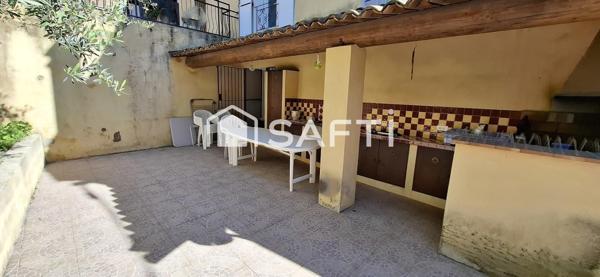 Maison de Maison de village de 145 m² avec grande terrasse et garage, idéalement située au cœur du centre ancien. À découvrir sans tarder !