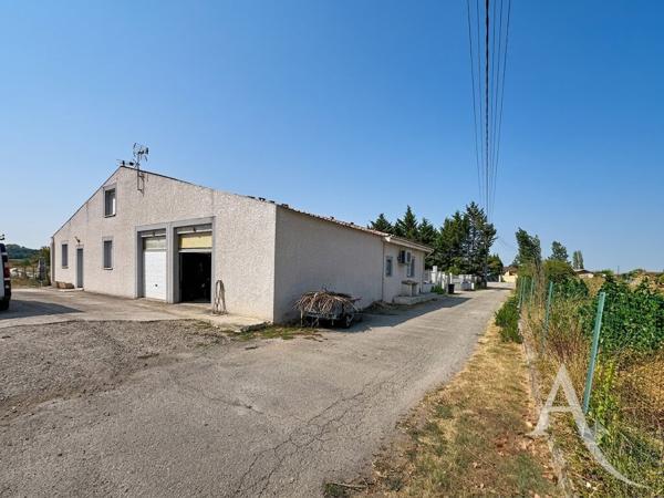 Bâtiment divisée en 2 PARTIES - HANGAR et LOGEMENT DE FONCTION Lherm