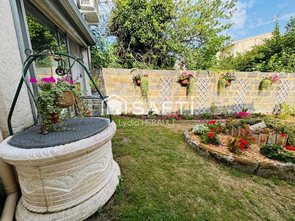 Immeuble de rapport composé d'un local commercial et d'un grand appartement avec extérieur, plein coeur de Ruelle sur Touvre