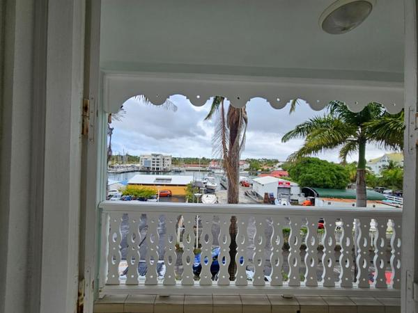 🌊 À Vendre : Superbe T2 avec Vue Mer à Saint-François (97118) ! 🌴✨