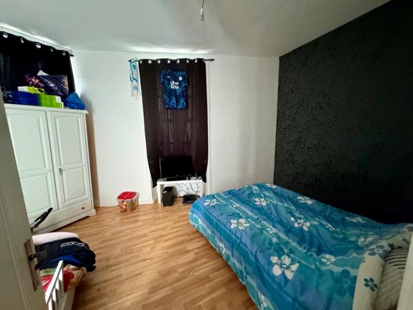 Immeuble de rapport avec local commercial et 2 appartements