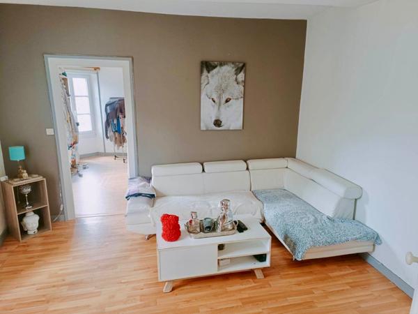 Immeuble de rapport avec local commercial et 2 appartements