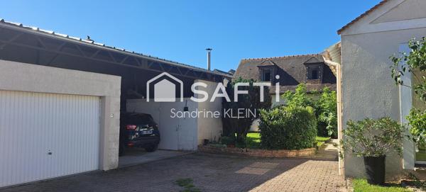 Maison 158 m², 7 pièces, avec véranda, garage et préau