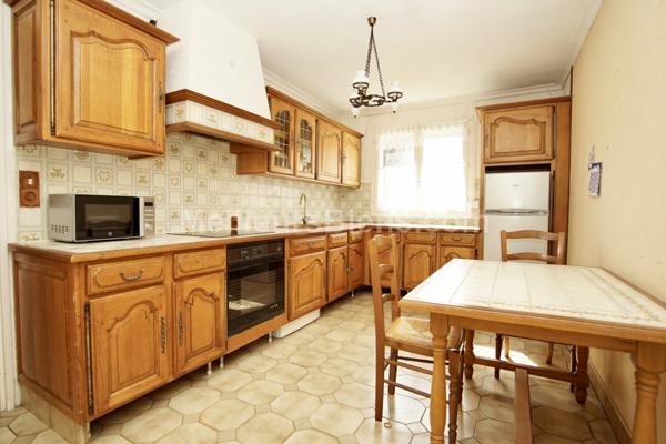 maison plain-pied 105 m2, 3 chambres, combles aménageables, garage sur terrain 520 m2