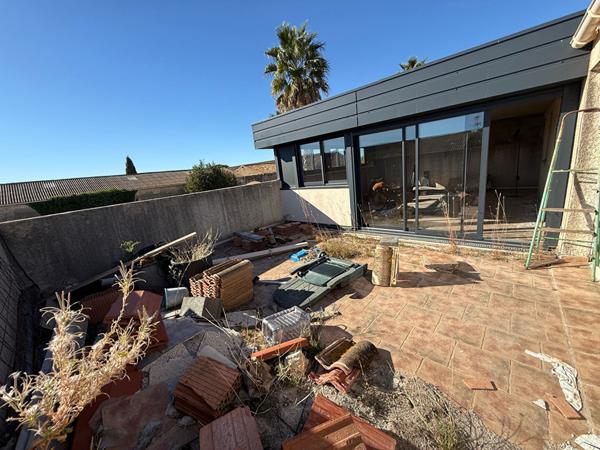 Appartement T 2 avec terrasse et véranda