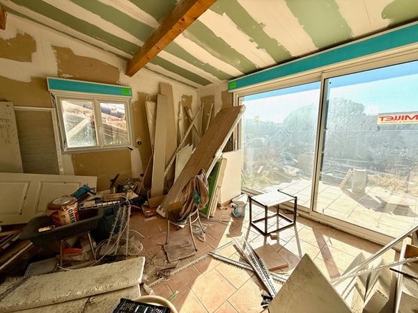 Appartement T 2 avec terrasse et véranda