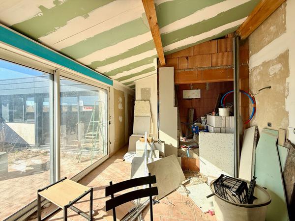 Appartement T 2 avec terrasse et véranda