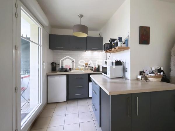 Studio avec une grande terrasse (27 m2) et parking en sous-sol
