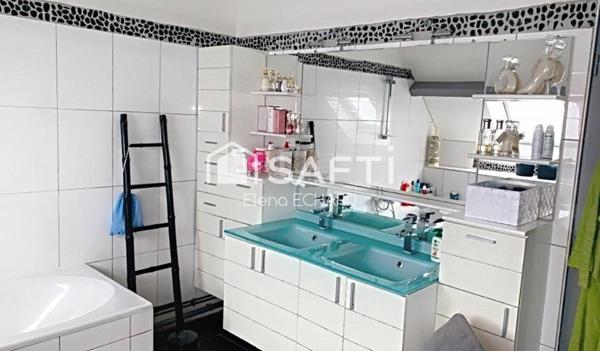 Maison familiale de 5 chambres sur 1500 m2 de terrain arboré et clos