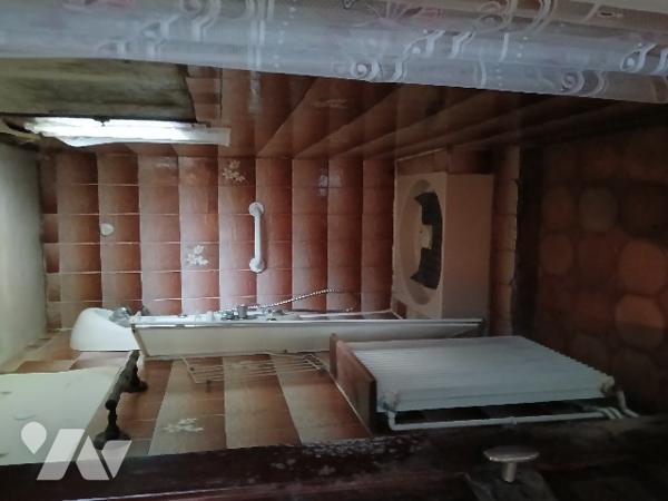 UNE MAISON D'HABITATION