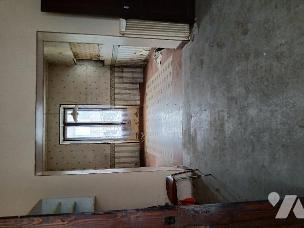 UNE MAISON D'HABITATION