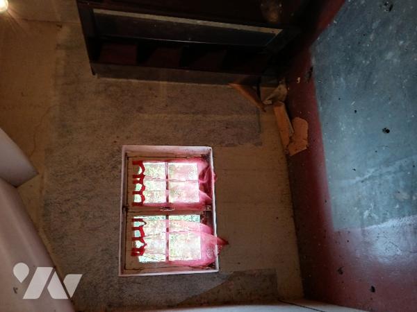 UNE MAISON D'HABITATION