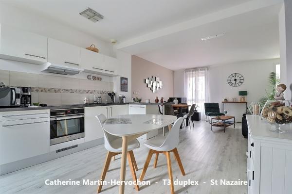 Ambiance "Maison" pour ce charmant duplex de 2 chambres avec parking extérieur sécurisé