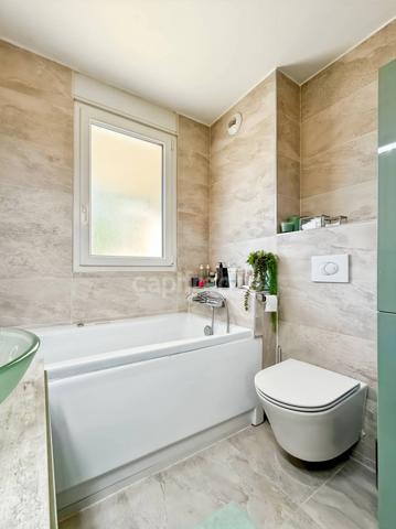 Appartement à vendre 3 pièces DIVONNE LES BAINS (01) - 91m2 - jardin (350m2), cave (10m2), garage (21m2)