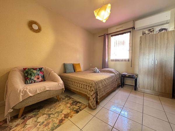 97400 SAINT DENIS A LOUER - Saint-Denis La Providence - Appartement T4 meublé avec 2 chambres donnant vue sur l'océan