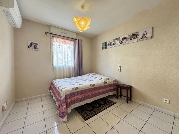 97400 SAINT DENIS A LOUER - Saint-Denis La Providence - Appartement T4 meublé avec 2 chambres donnant vue sur l'océan