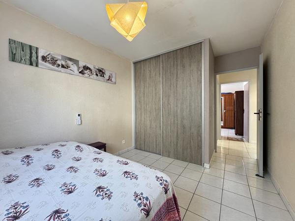97400 SAINT DENIS A LOUER - Saint-Denis La Providence - Appartement T4 meublé avec 2 chambres donnant vue sur l'océan