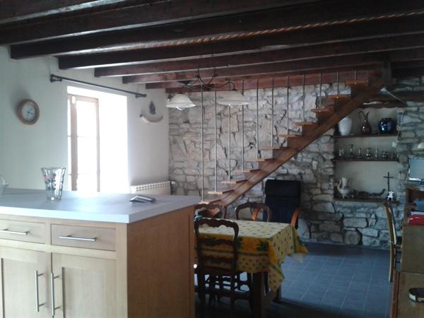 Une maison à usage d'habitation (ancienne ferme), avec aisances et dépendances,