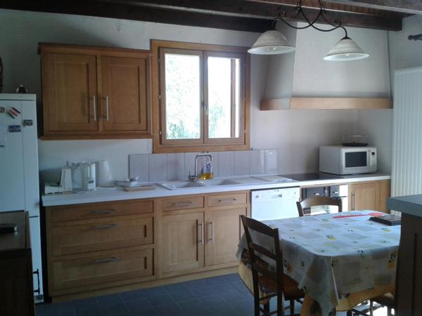 Une maison à usage d'habitation (ancienne ferme), avec aisances et dépendances,