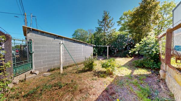Maison de 53 m2 avec jardin et garage.