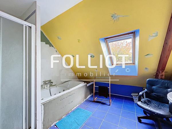 Maison spacieuse à vendre à Avranches - 5 chambres, jardin de 900 m² !