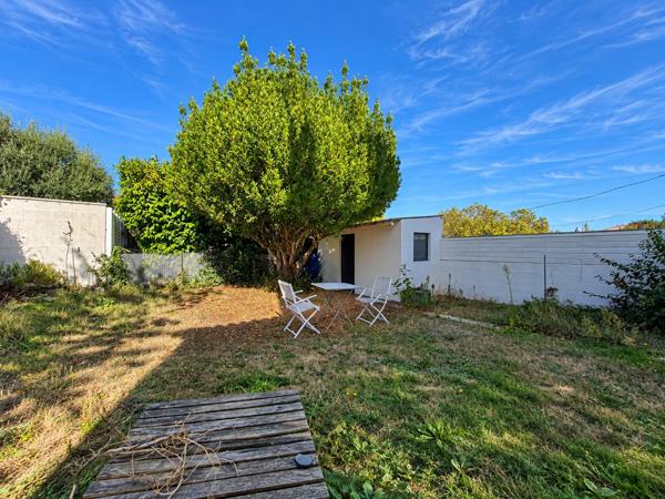 Maison individuelle avec jardin et garage proche centre-ville