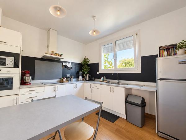 Maison individuelle avec jardin et garage proche centre-ville