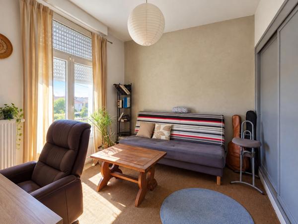 Maison individuelle avec jardin et garage proche centre-ville