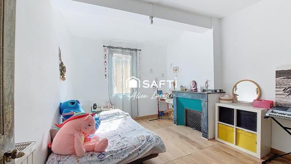 Maison atypique au cœur du village